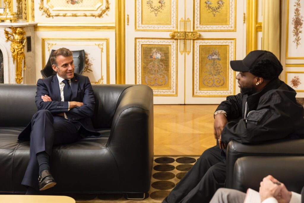 Davido, French president Macron in a meeting
