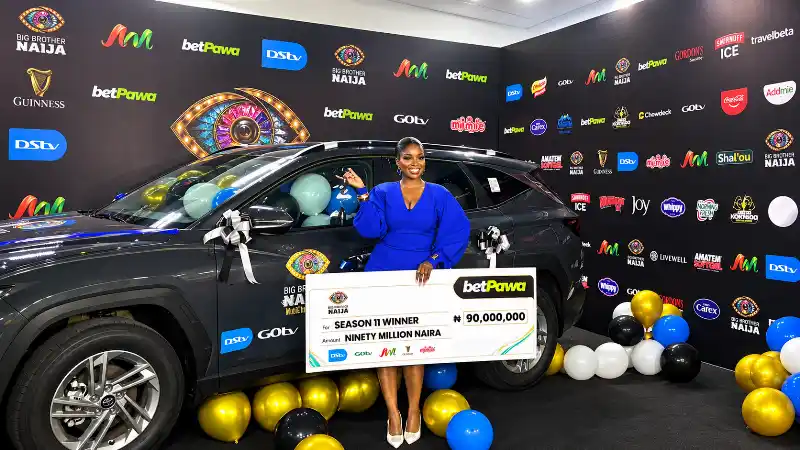 BBNaija Winner Temi Nkem Poses with N60m SUV, N90m Prize